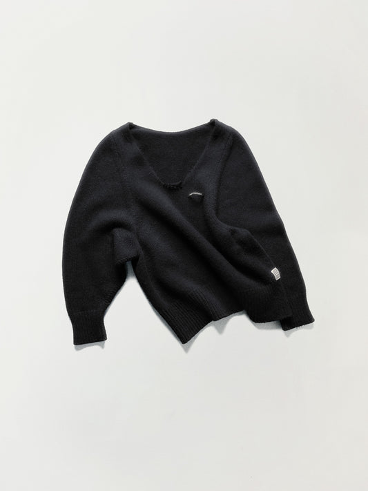 DECONSTRUCTED V-NECK SWEATER