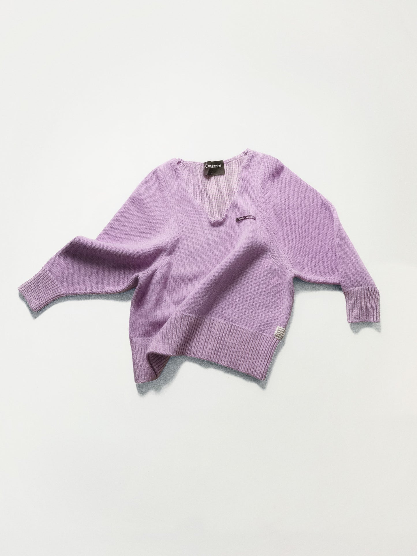 DECONSTRUCTED V-NECK SWEATER